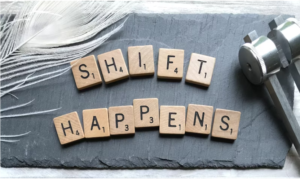 photograph of grey slate that says Shift Happens