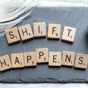 photograph of grey slate that says Shift Happens