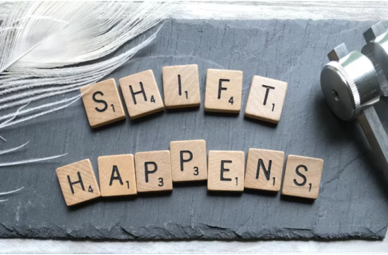 photograph of grey slate that says Shift Happens